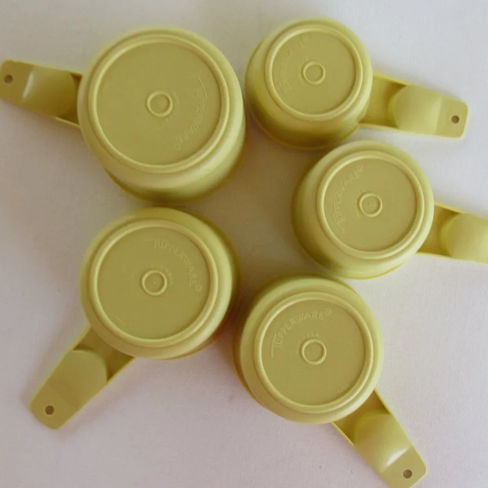 Vintage 1970s Tupperware Yellow Nesting Measuring Cup Set of 5 Made In U.S.A
